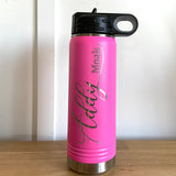 Pink water bottle with a name engraved on it