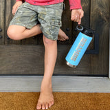 Photo of a boy holding a blue water bottle